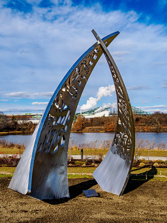 A picture of the Endeavor Sculpture in Bohenko Gateway Park on a sunny day.