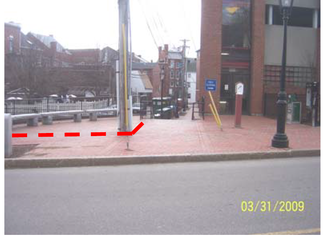 Vending space on brick sidewalk on Hanover Street in front of Parking Garage