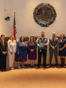 City Council, staff, in chambers for Domestic Violence Awareness Month 