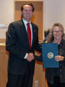 Mayor McEachern with a representative from New Hampshire Healthy Climate