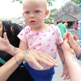 Children Getting Hands Stamped