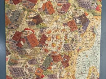 multiple houses, ariel view, beach and lake on the side, flowers in the middle
