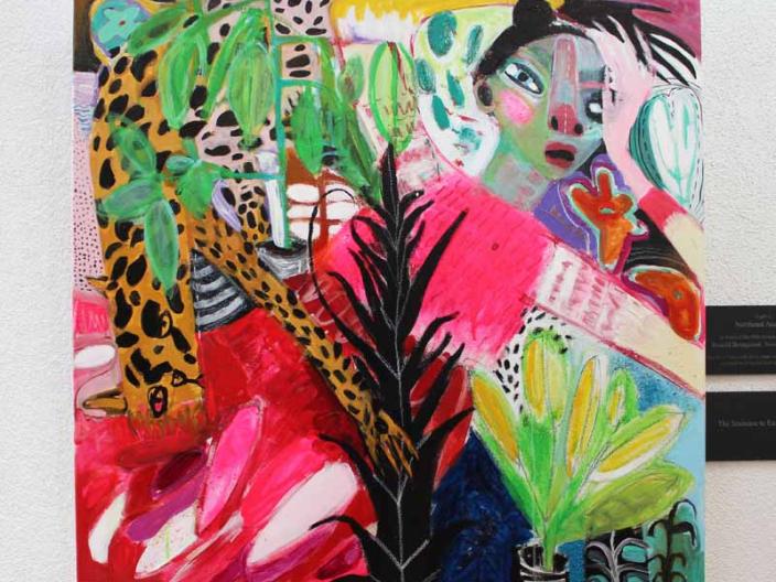 Painting of a woman and a leopard