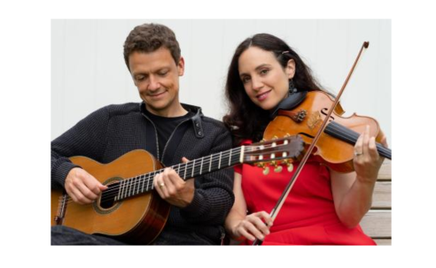 Dan Acsadi playing a guitar and Leticia Prieto Alvarez playing a viola