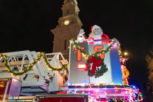 Santa riding a Portsmouth NH fire truck.