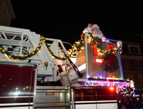 Santa riding a Portsmouth NH fire truck.