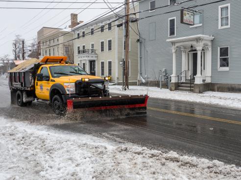 A City snow plow in action - photo by Ken Goldman.