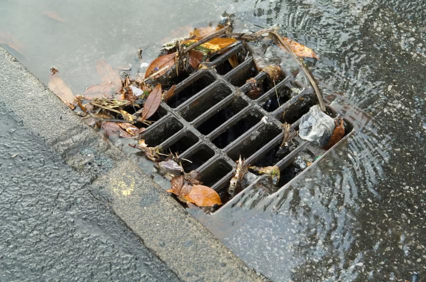 Picture of a storm drain in the rain