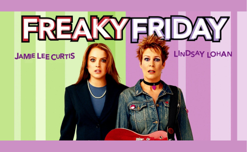 Lindsay Lohan and Jamie Lee Curtis stand with a guitar Freaky Friday