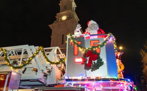 Santa riding a Portsmouth NH fire truck.