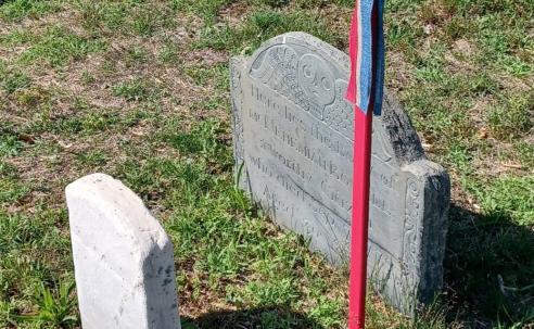  Revolutionary War veteran’s gravesite in North Cemetery, identified with a red, white and blue marker placed temporarily for the America 250th