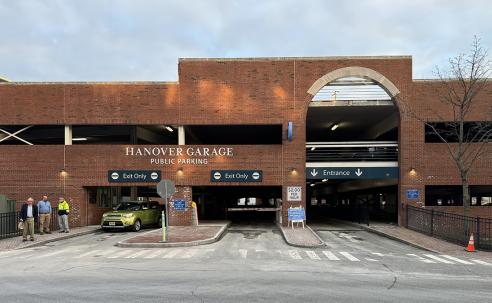 a picture of the main entrance of the Hanover Parking Garage on a sunny day